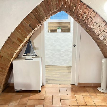 Gli Archi Nel Cuore Di סיינה מראה חיצוני תמונה