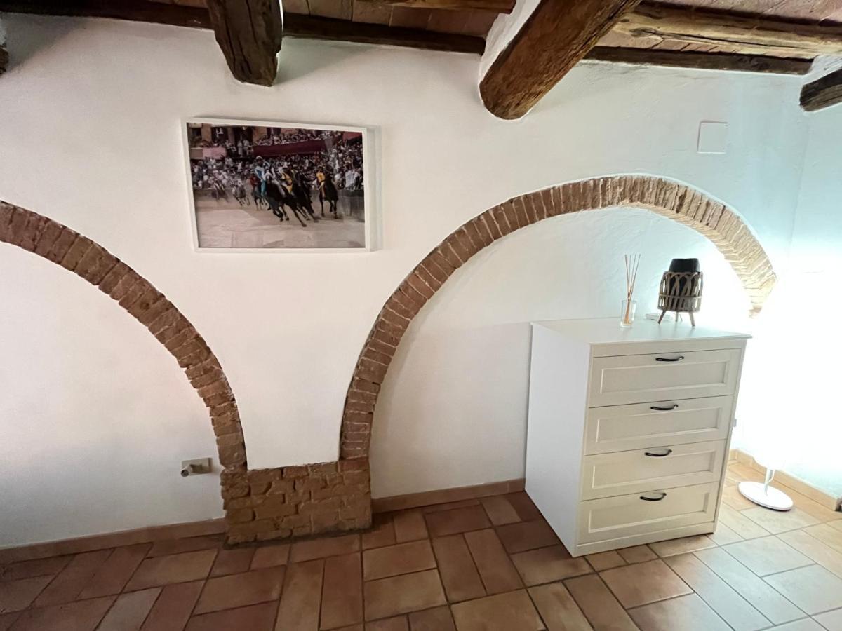 Gli Archi Nel Cuore Di סיינה מראה חיצוני תמונה