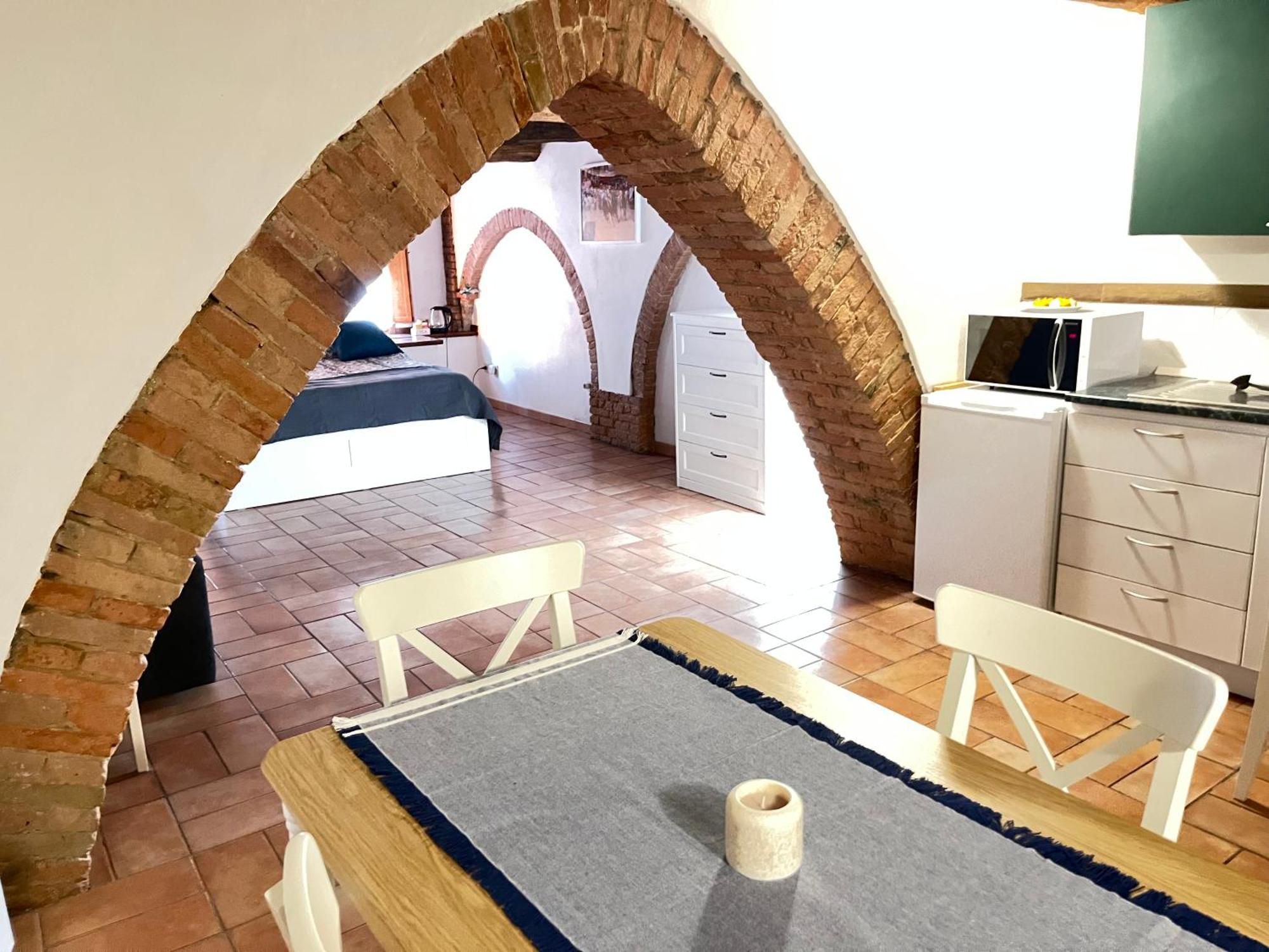Gli Archi Nel Cuore Di סיינה מראה חיצוני תמונה